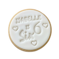 Personalised 6th birthday round white signature vanilla sugar biscuits. Each biscuit is embossed with the name.