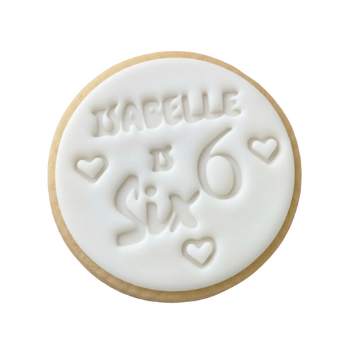 Personalised 6th birthday round white signature vanilla sugar biscuits. Each biscuit is embossed with the name.