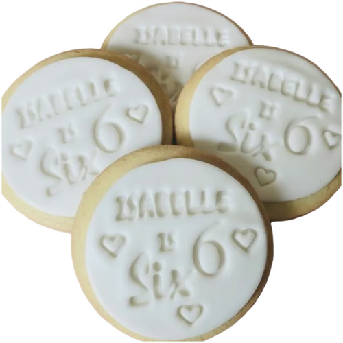 Personalised 6th birthday round white signature vanilla sugar biscuits. Each biscuit is embossed with the name.
