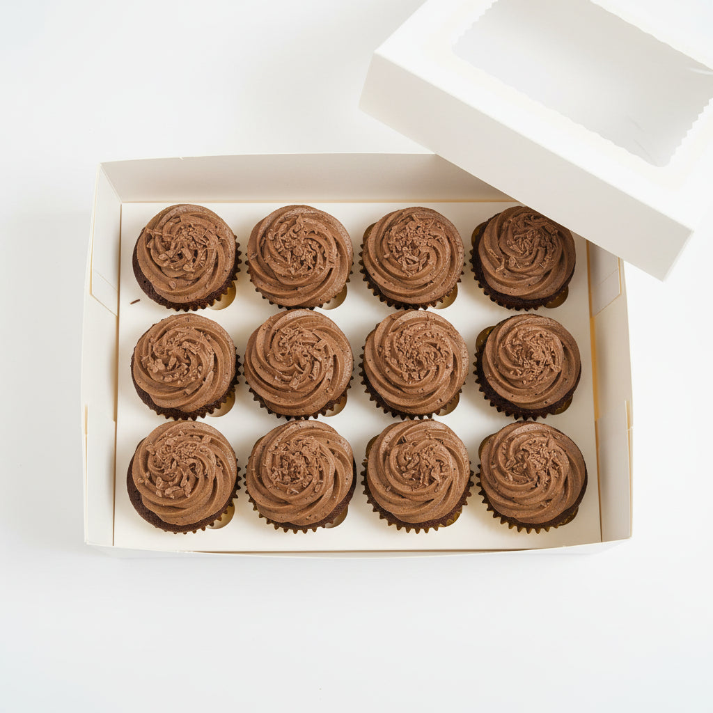 An assortment box of belgium chocolate-frosted cupcakes